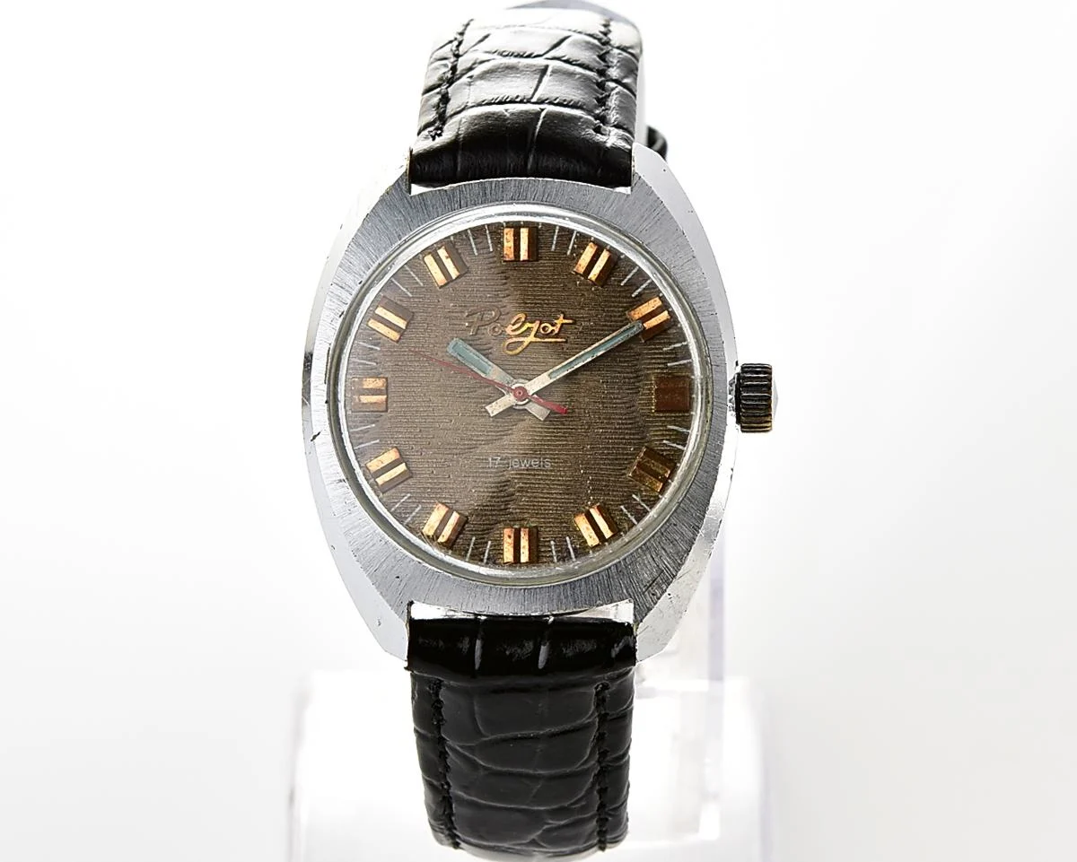 Vintage Soviet Poljot mechanical watch with intricate textured dial