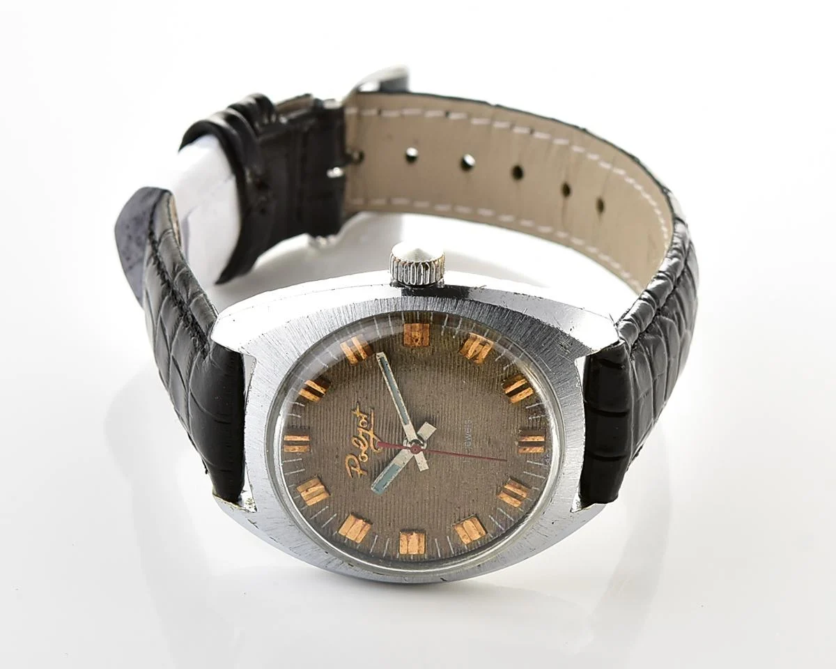 Vintage Soviet Poljot mechanical watch with intricate textured dial