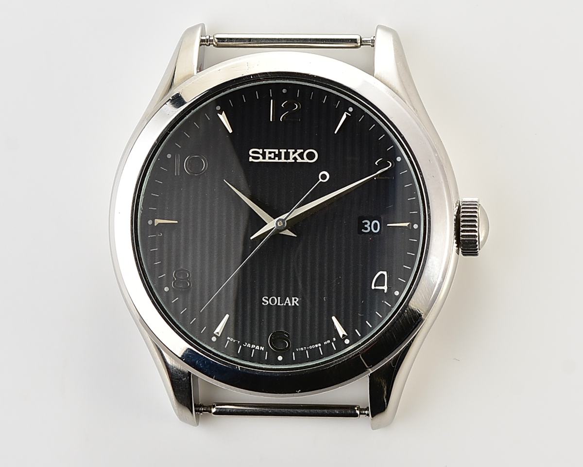 Sleek Sustainability: Seiko Solar Dress Watch with stark black textured dial