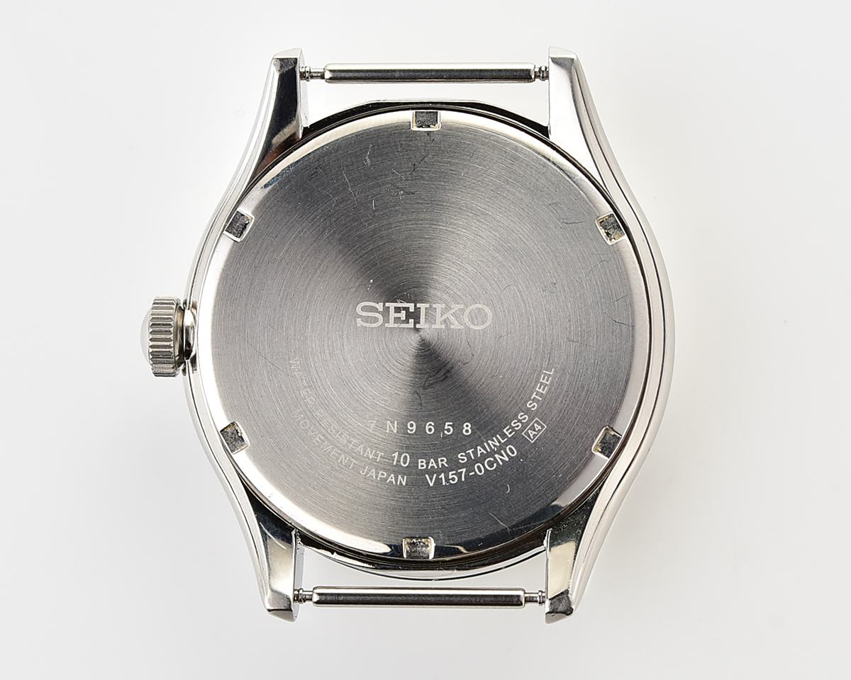 Sleek Sustainability: Seiko Solar Dress Watch with stark black textured dial
