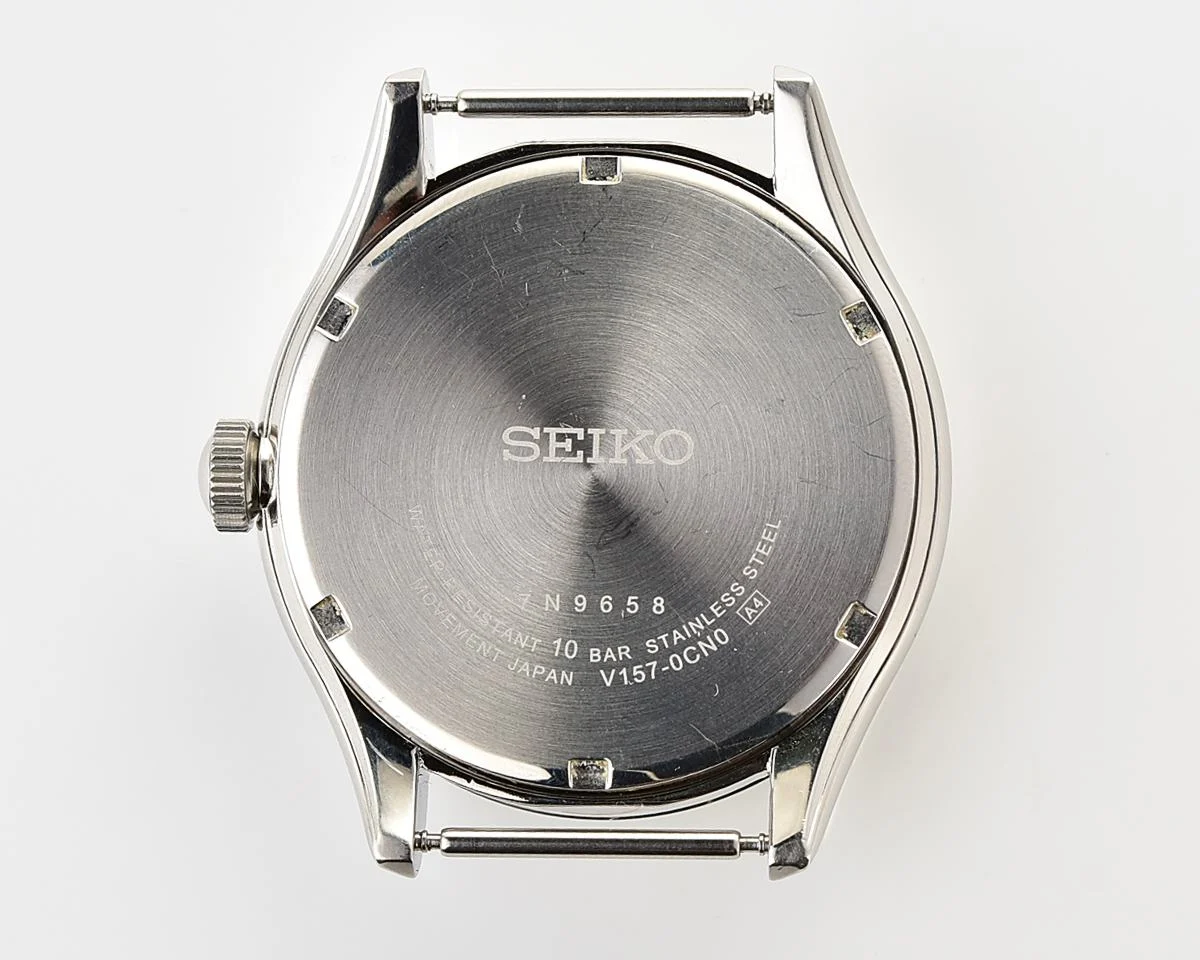Sleek Sustainability: Seiko Solar Dress Watch with stark black textured dial