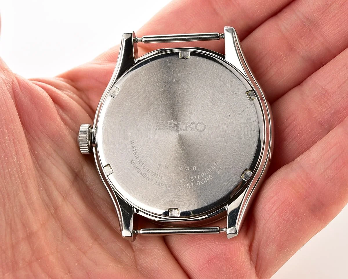 Sleek Sustainability: Seiko Solar Dress Watch with stark black textured dial