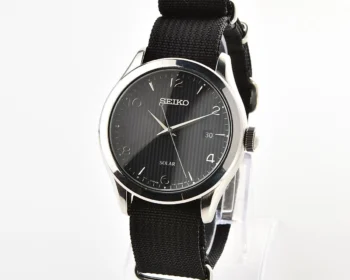 Sleek Sustainability: Seiko Solar Dress Watch with stark black textured dial