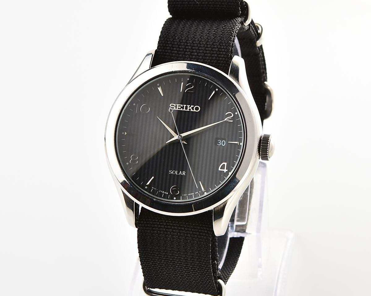 Sleek Sustainability: Seiko Solar Dress Watch with stark black textured dial