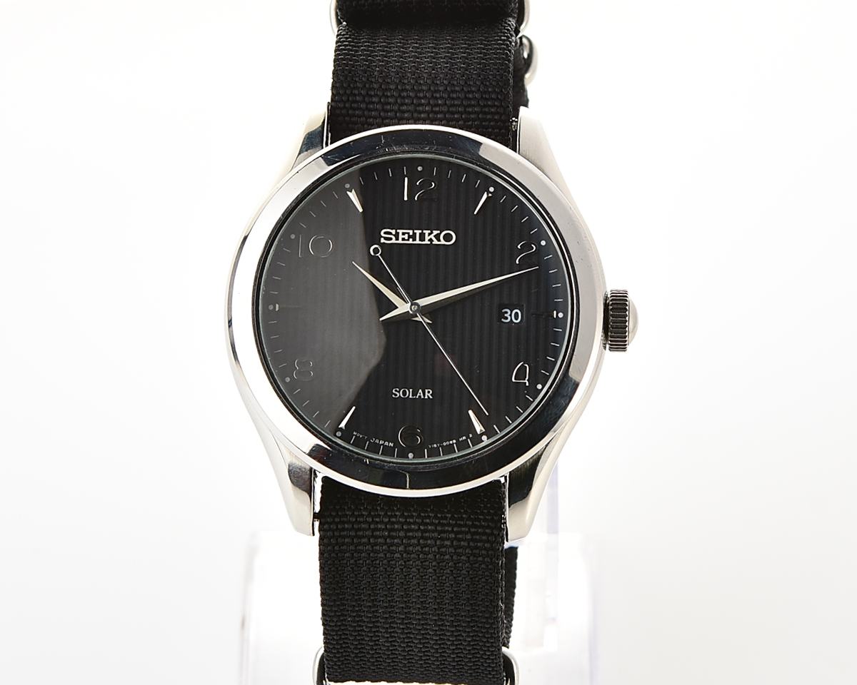 Sleek Sustainability: Seiko Solar Dress Watch with stark black textured dial