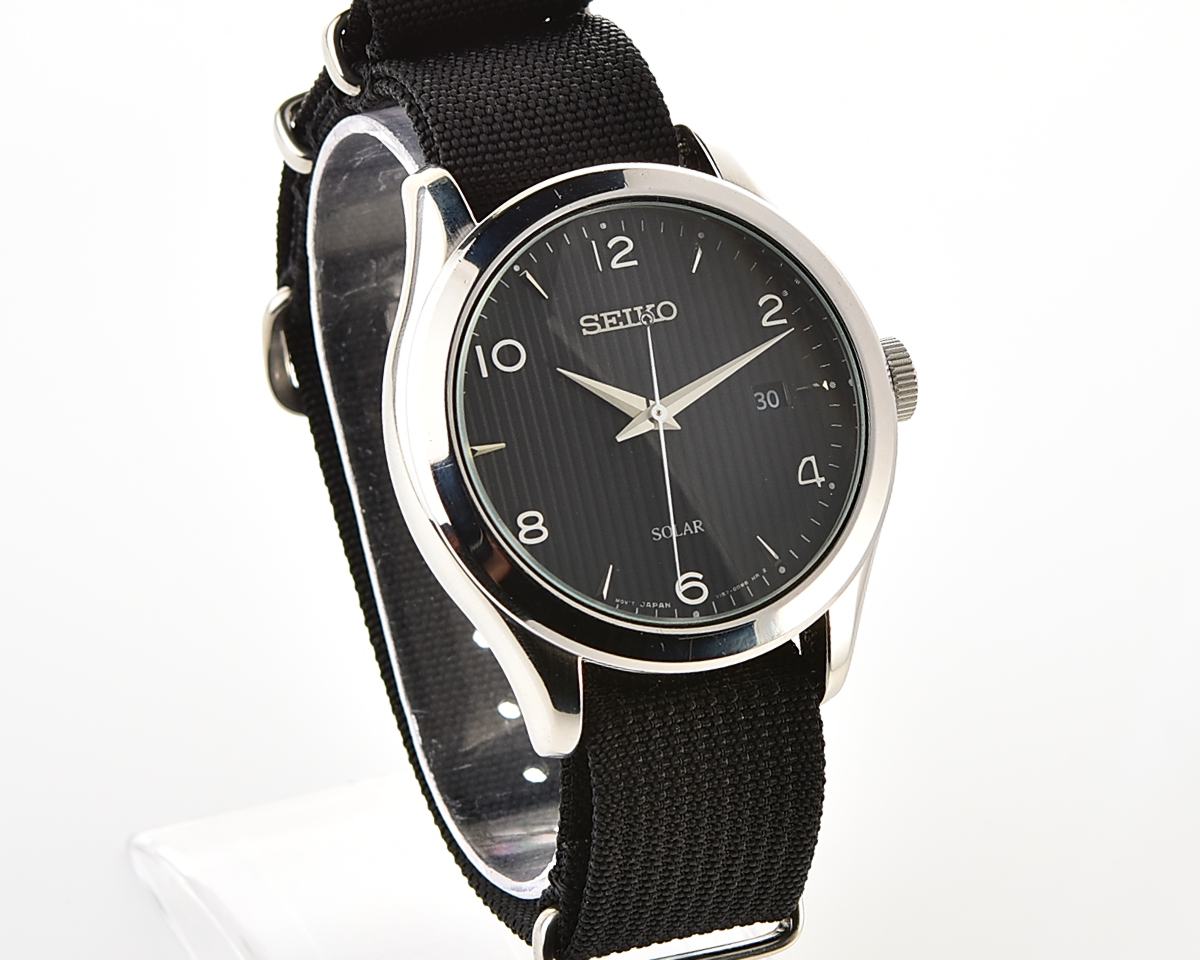 Sleek Sustainability: Seiko Solar Dress Watch with stark black textured dial