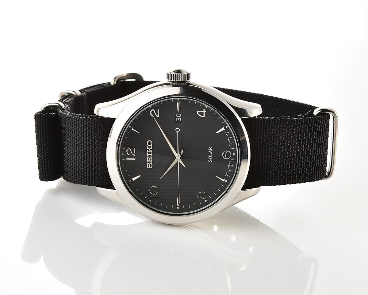 Sleek Sustainability: Seiko Solar Dress Watch with stark black textured dial