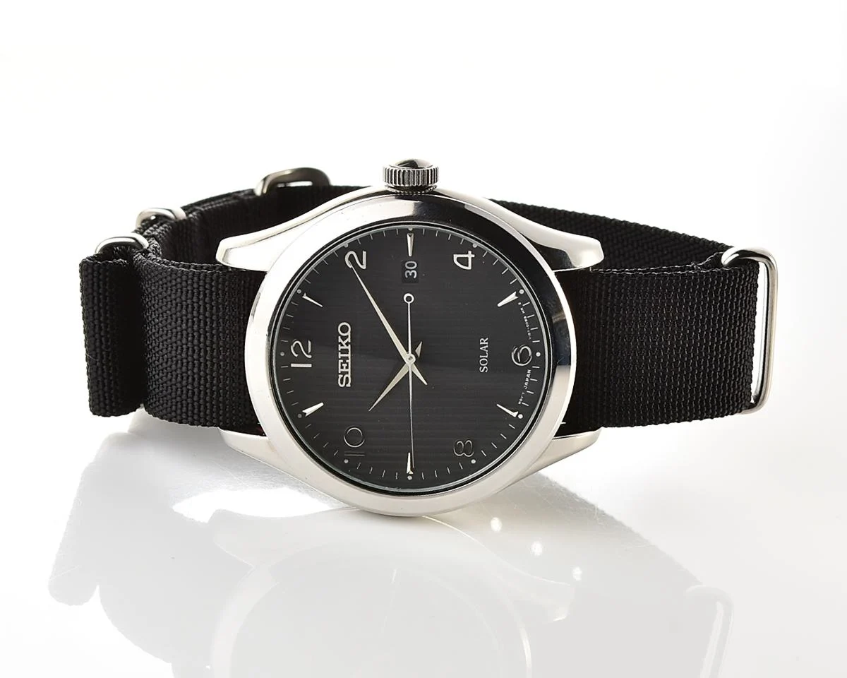 Sleek Sustainability: Seiko Solar Dress Watch with stark black textured dial