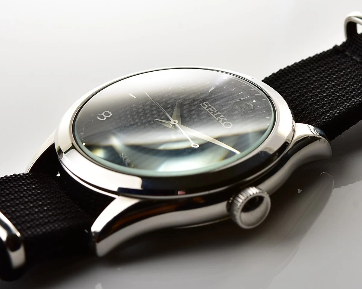 Sleek Sustainability: Seiko Solar Dress Watch with stark black textured dial