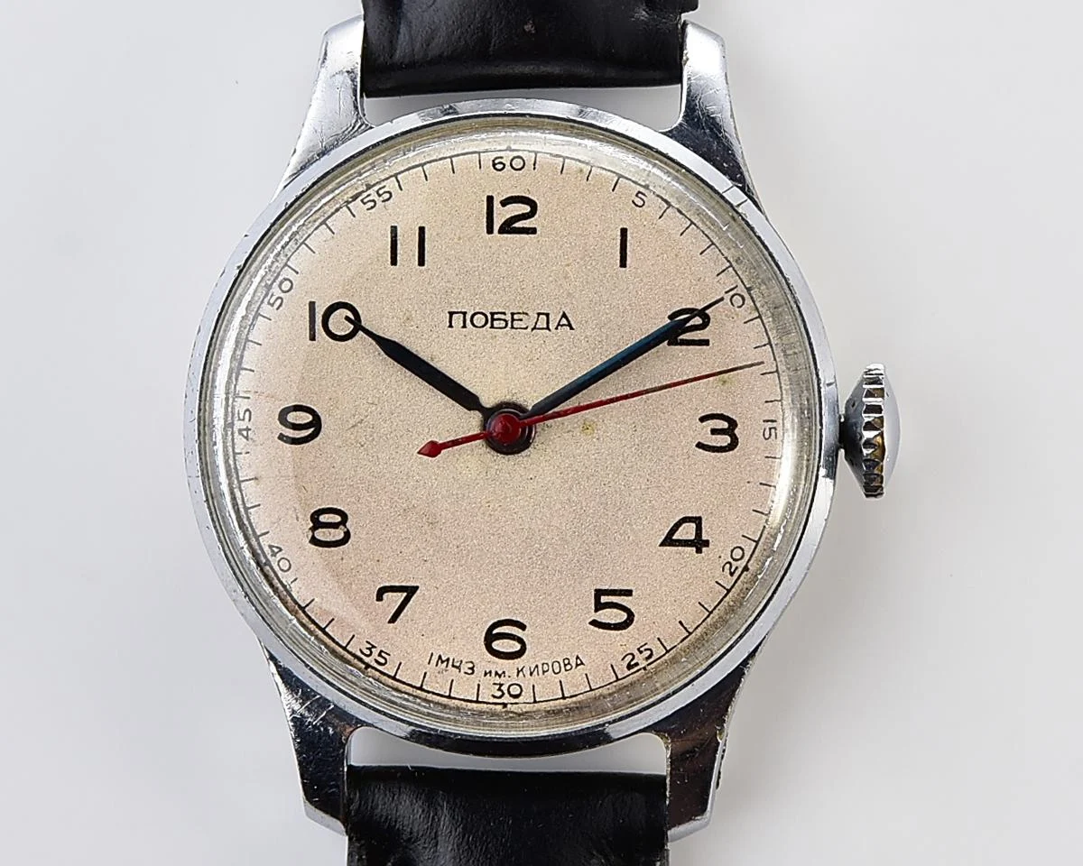 Excellent vintage Pobeda watch with central seconds hand and diamond shaped crown!