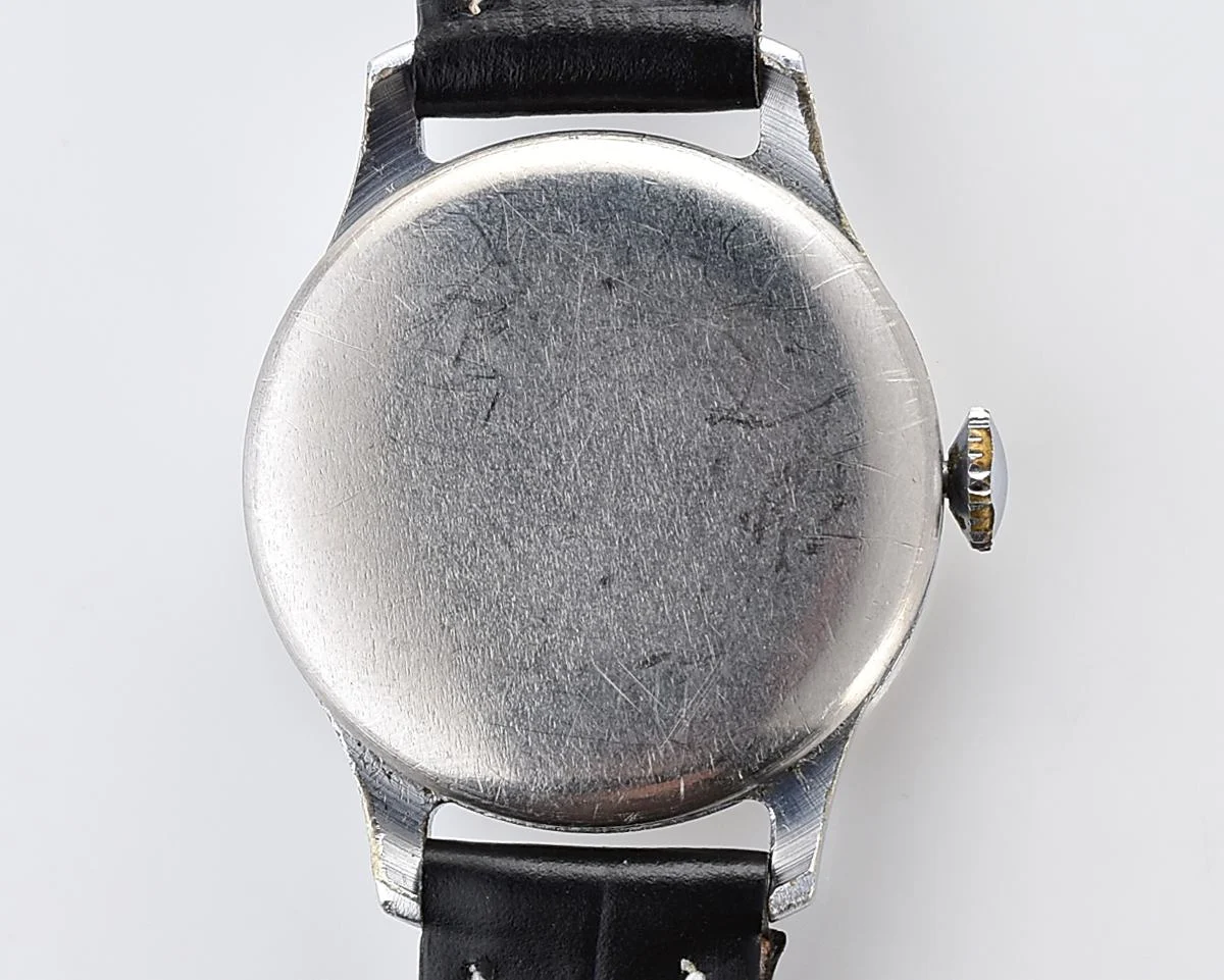 Excellent vintage Pobeda watch with central seconds hand and diamond shaped crown!