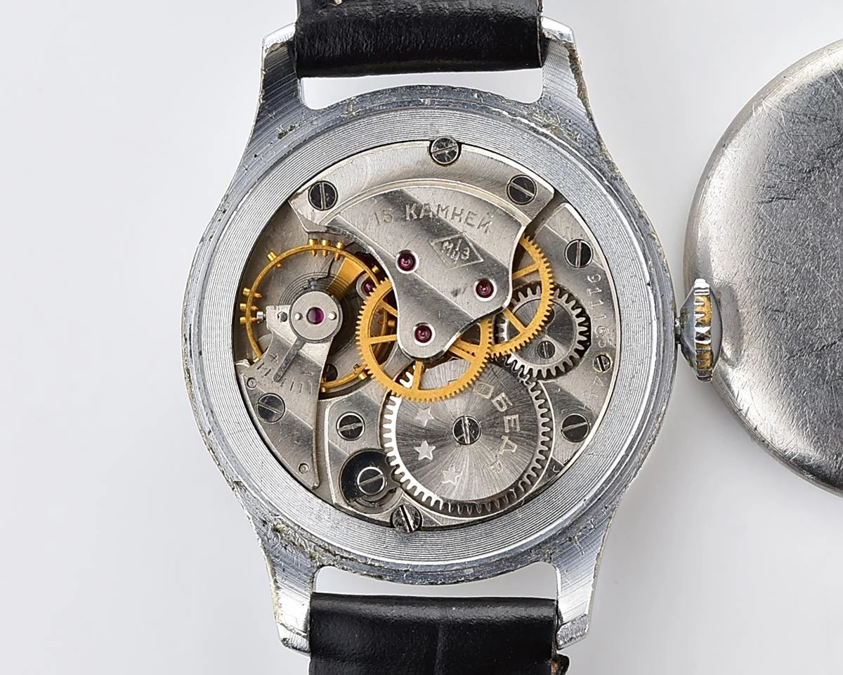 Excellent vintage Pobeda watch with central seconds hand and diamond shaped crown!