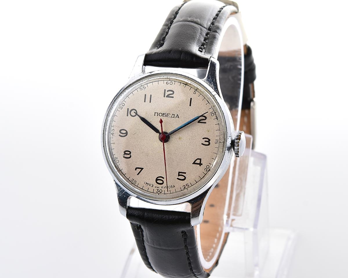 Excellent vintage POBEDA watch with central seconds hand and diamond shaped crown!