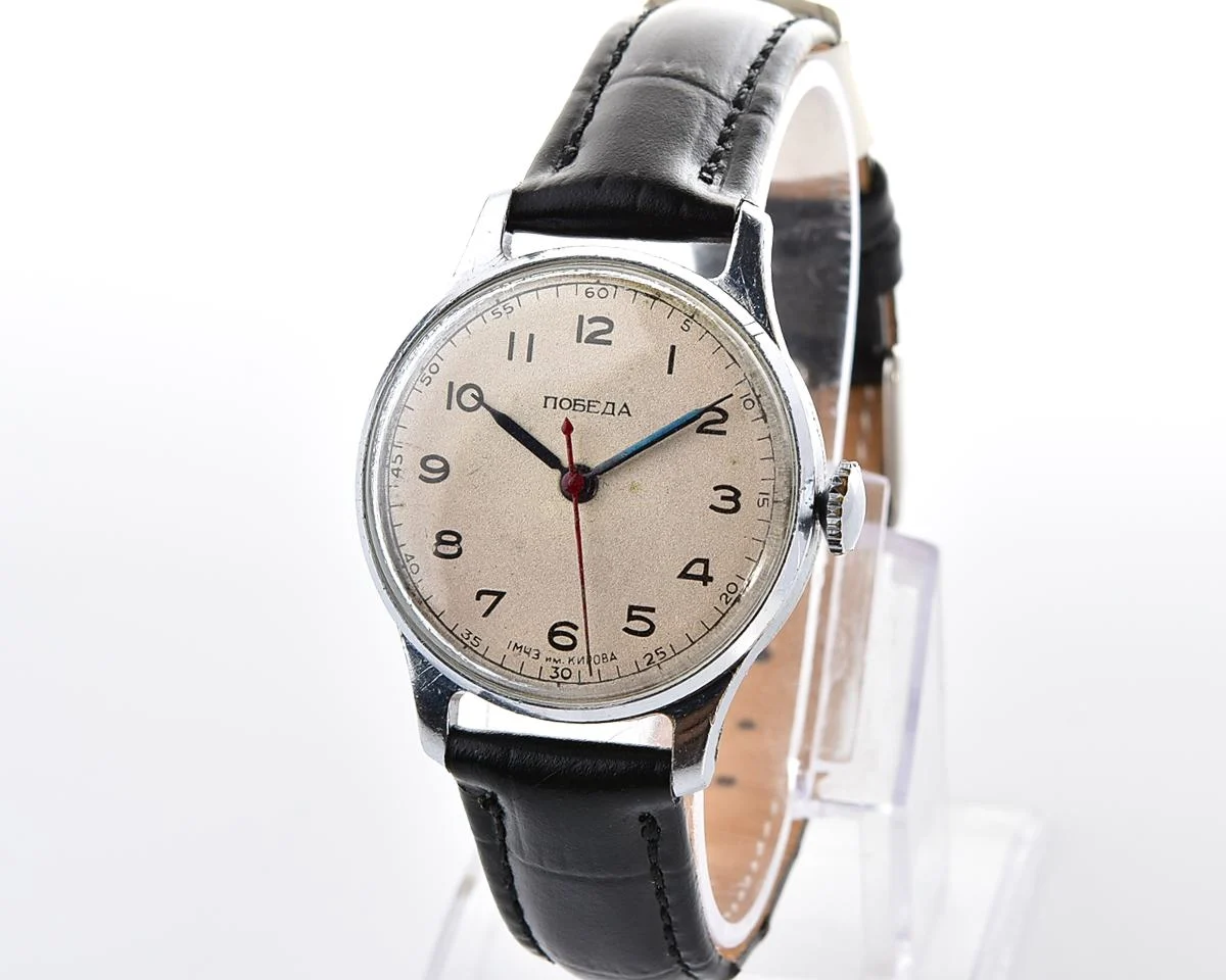 Excellent vintage Pobeda watch with central seconds hand and diamond shaped crown!