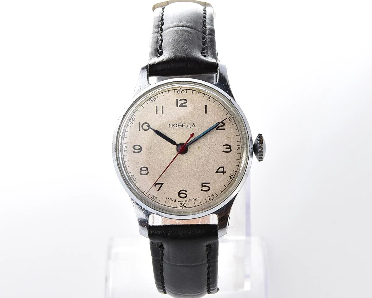 Excellent vintage Pobeda watch with central seconds hand and diamond shaped crown!