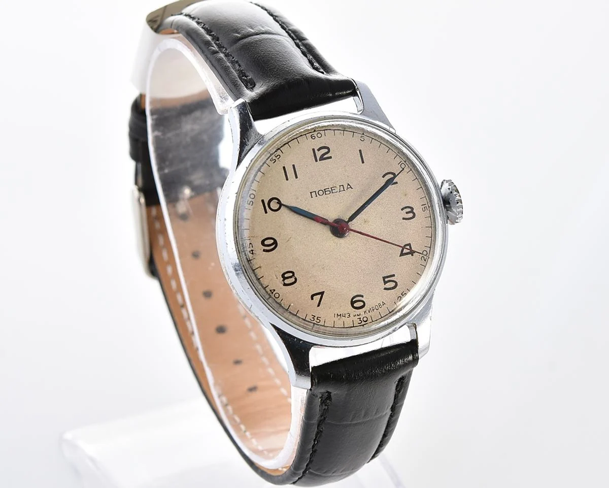 Excellent vintage Pobeda watch with central seconds hand and diamond shaped crown!
