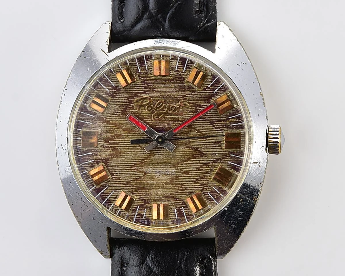 Vintage Soviet Poljot mechanical watch with intricate textured dial