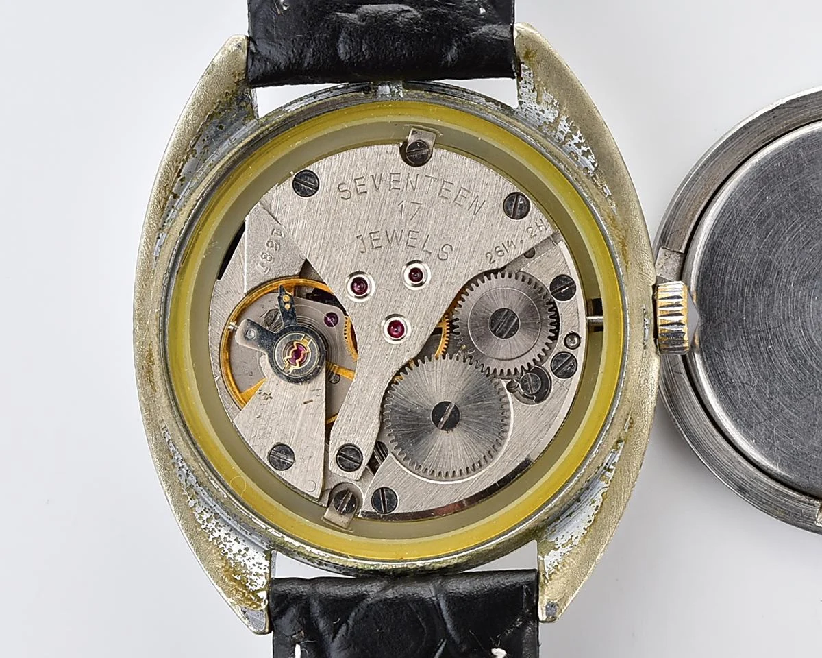 Vintage Soviet Poljot mechanical watch with intricate textured dial