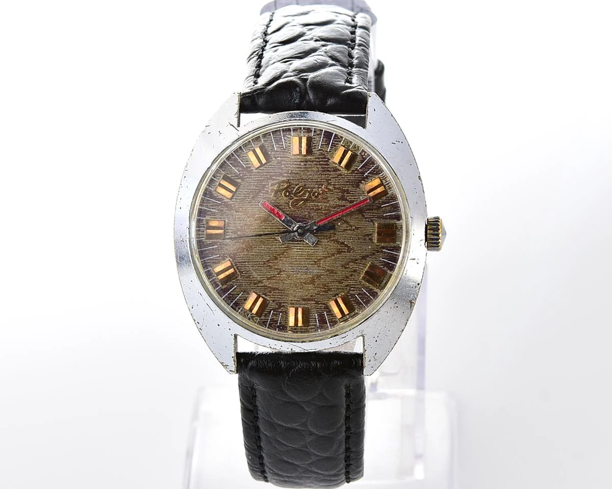 Vintage Soviet Poljot mechanical watch with intricate textured dial