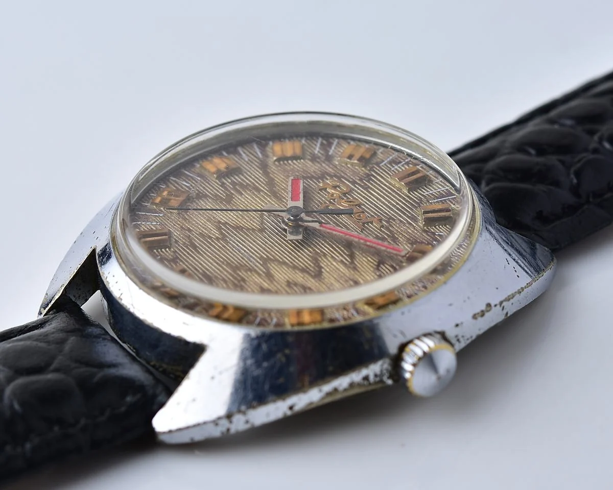 Vintage Soviet Poljot mechanical watch with intricate textured dial