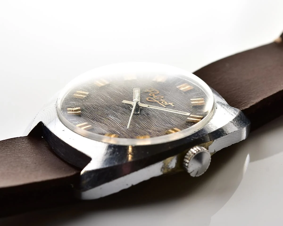 Vintage Soviet Poljot mechanical watch with intricate textured dial