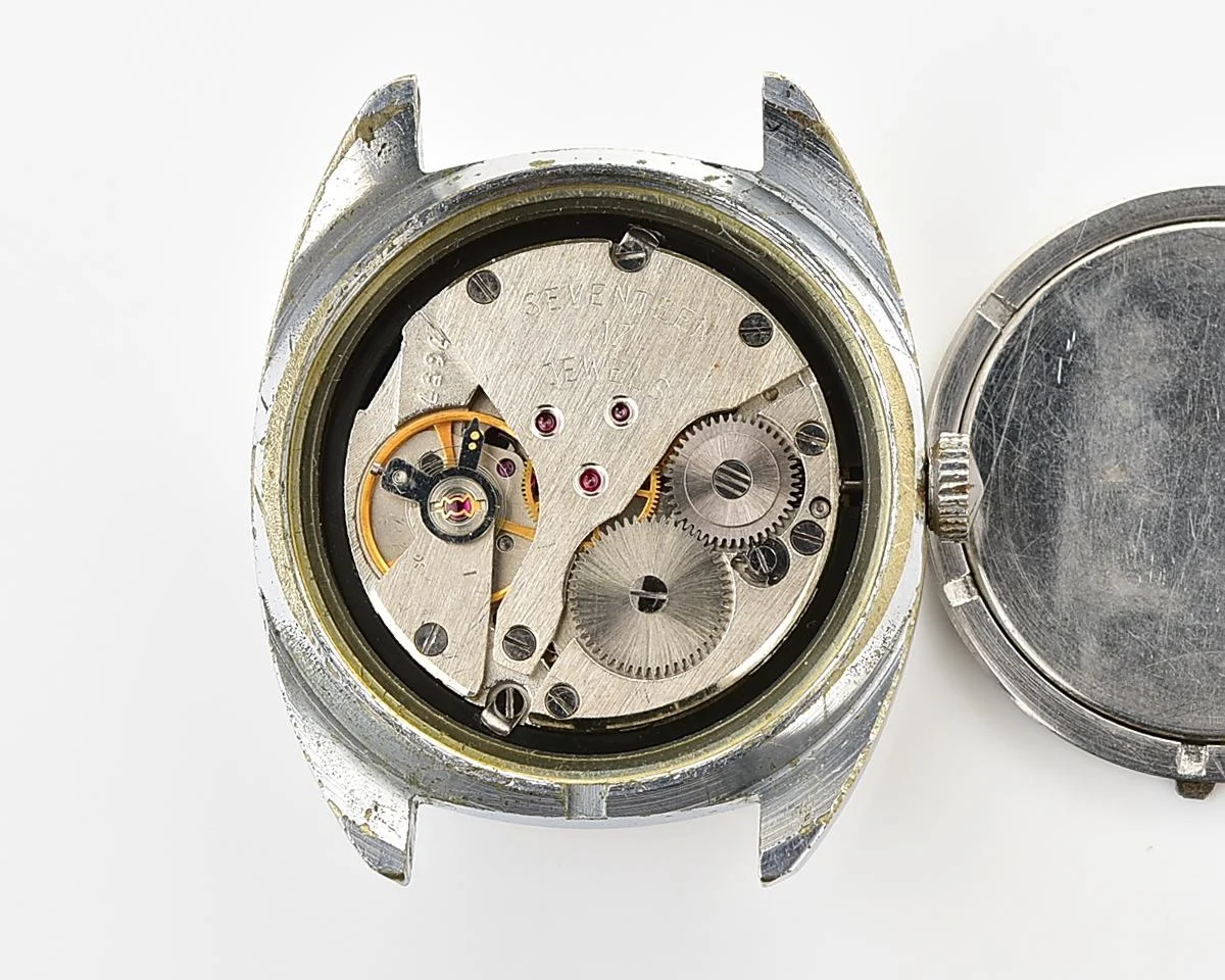 Vintage Soviet Poljot mechanical watch with intricate textured dial