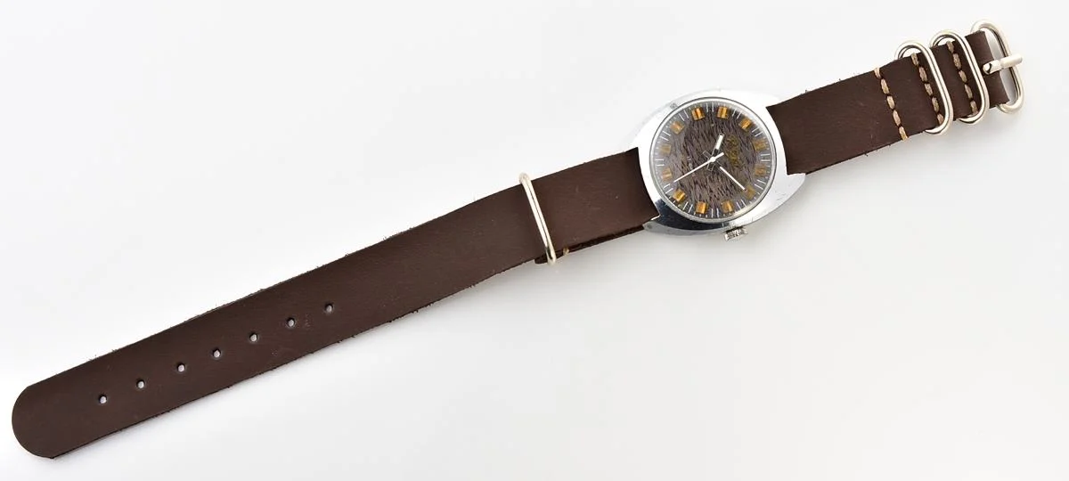 Vintage Soviet Poljot mechanical watch with intricate textured dial