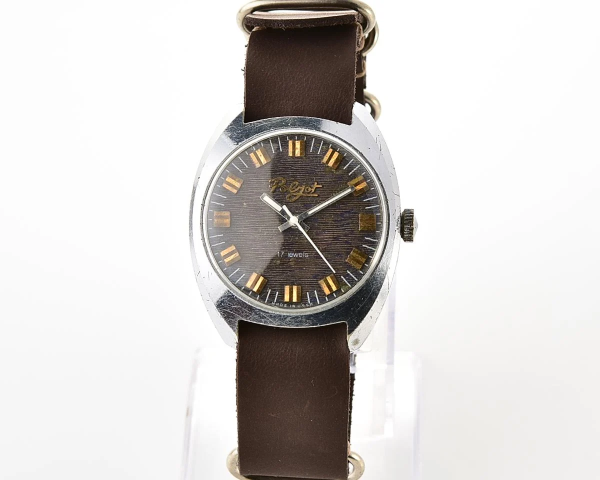 Vintage Soviet Poljot mechanical watch with intricate textured dial