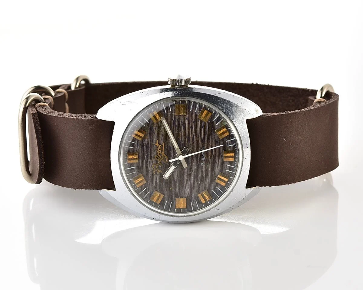 Vintage Soviet Poljot mechanical watch with intricate textured dial