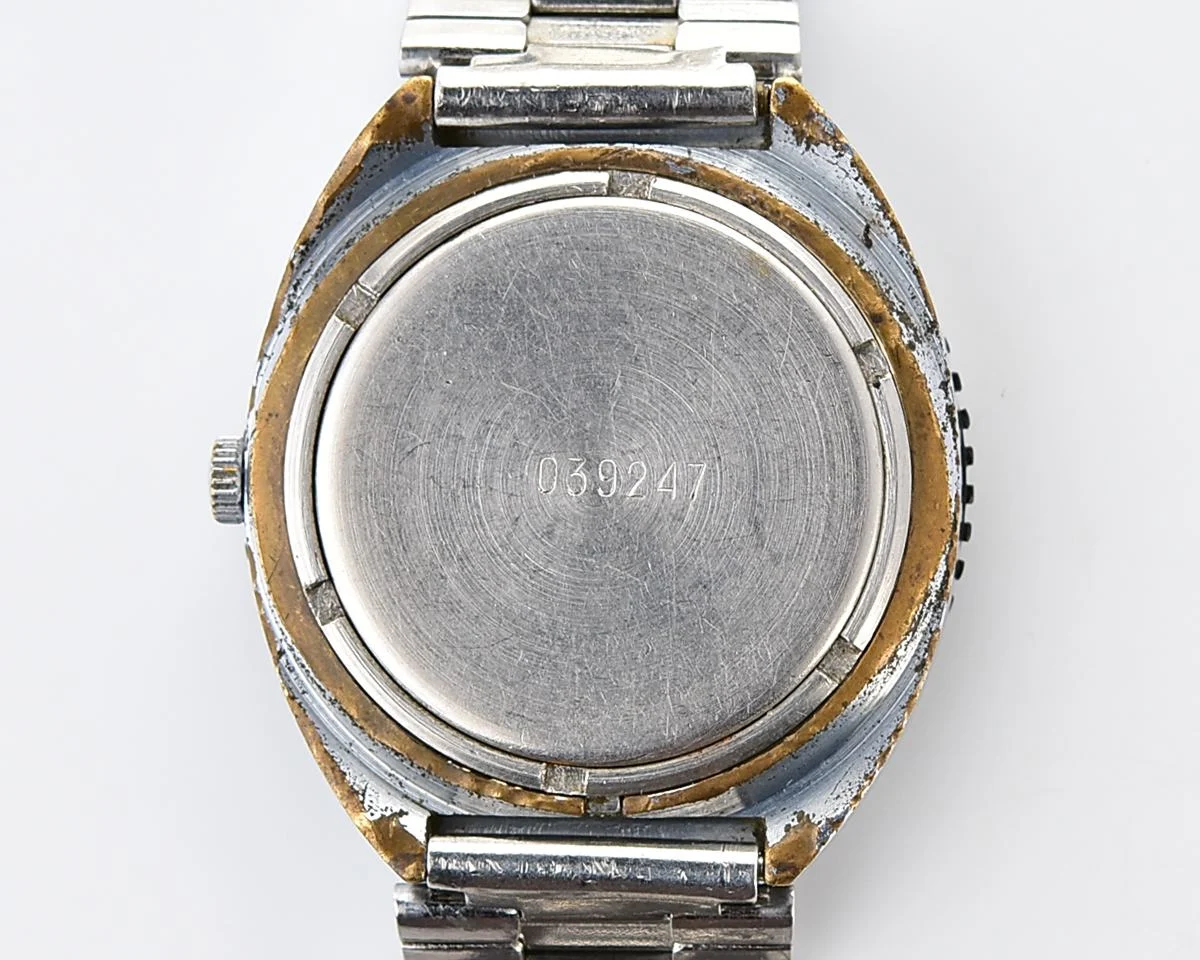 Vintage Soviet Raketa quartz watch with rotating bezel