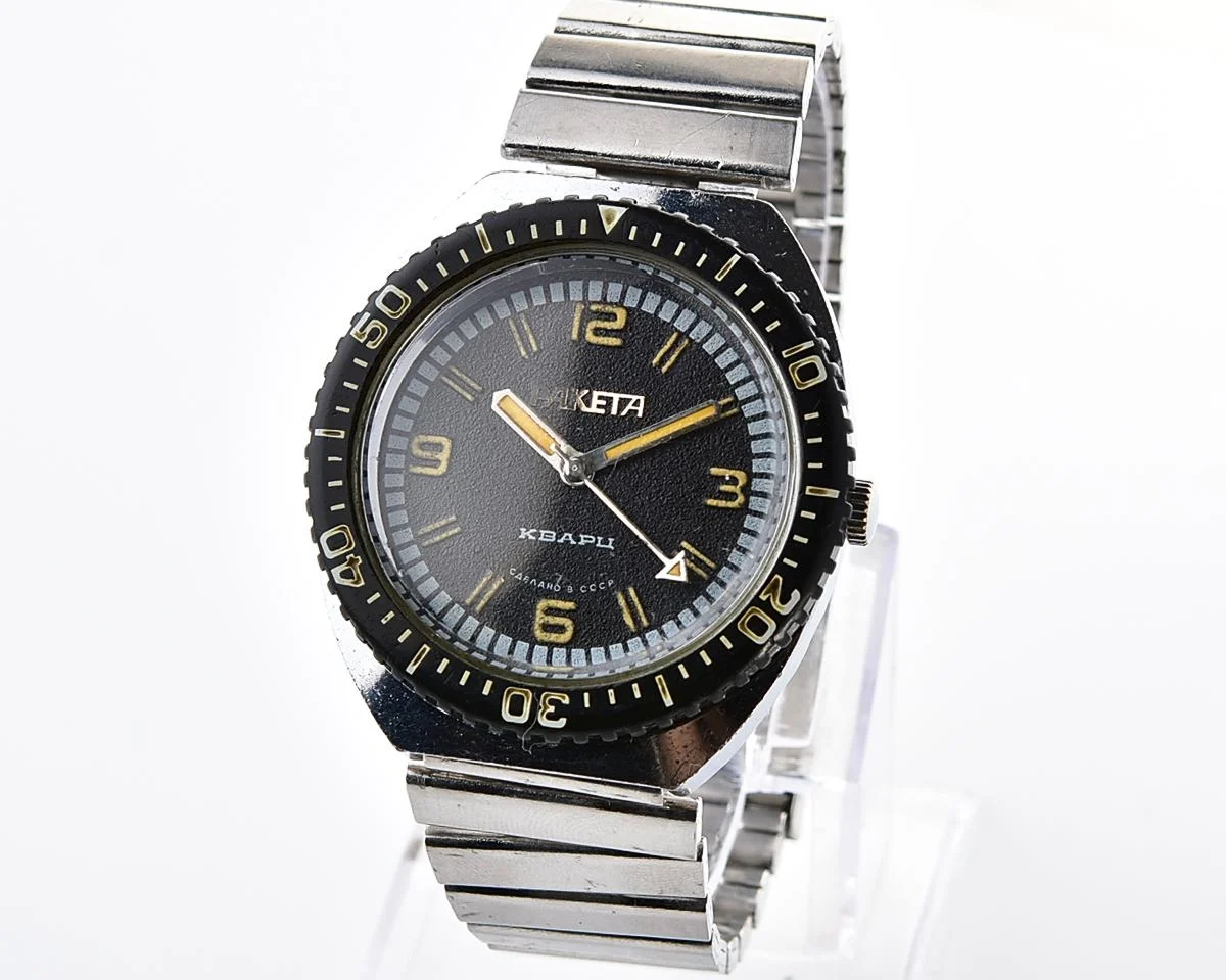 Vintage Soviet Raketa quartz watch with rotating bezel
