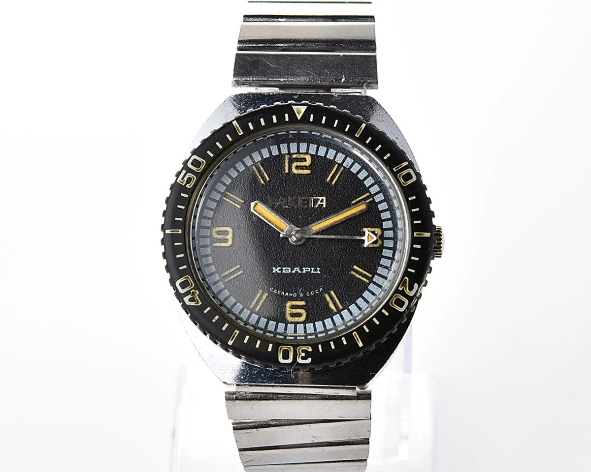 Vintage Soviet Raketa quartz watch with rotating bezel