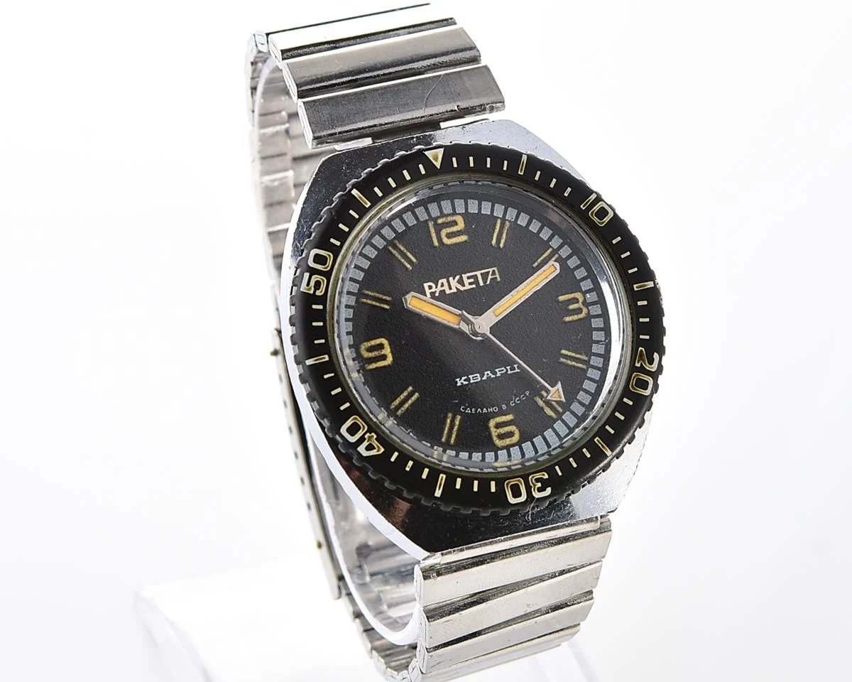 Vintage Soviet Raketa quartz watch with rotating bezel