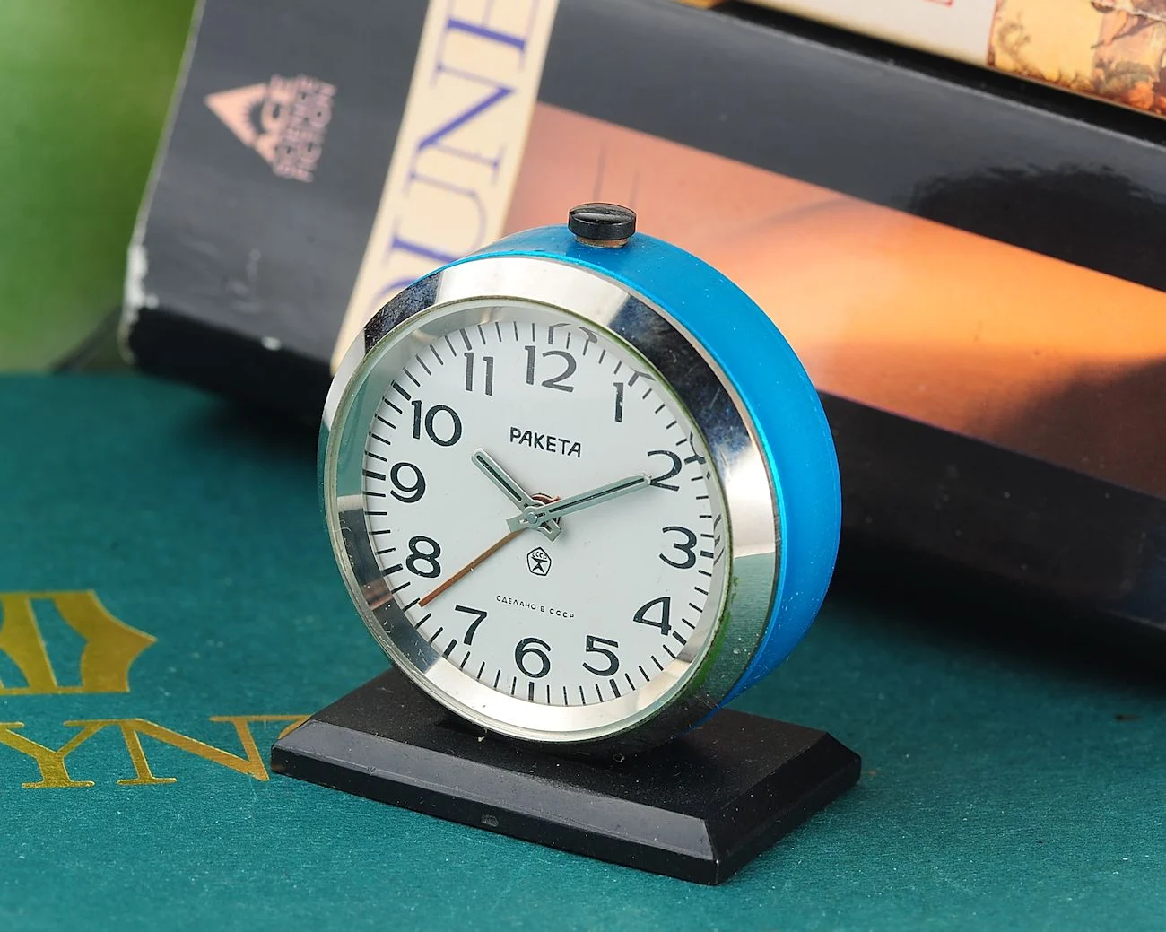 Small Raketa Soviet mechanical alarm clock - less than 2 inches in diameter