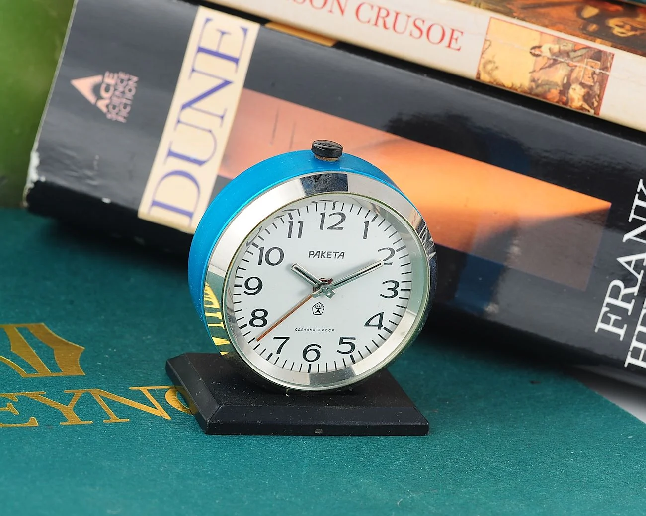 Small Raketa Soviet mechanical alarm clock - less than 2 inches in diameter