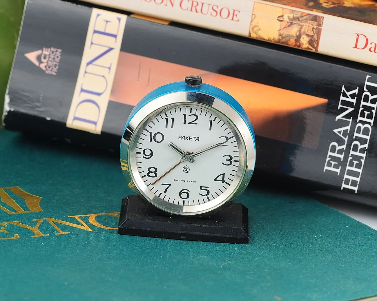 Small Raketa Soviet mechanical alarm clock - less than 2 inches in diameter