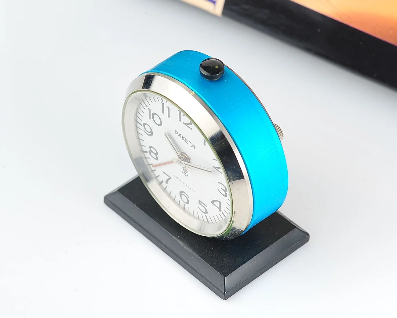 Small Raketa Soviet mechanical alarm clock - less than 2 inches in diameter