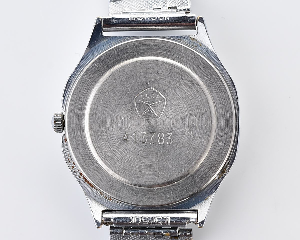 Luch quartz watch with moving Sun/Moon across the dial