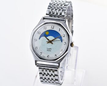 Luch quartz watch with moving Sun/Moon across the dial