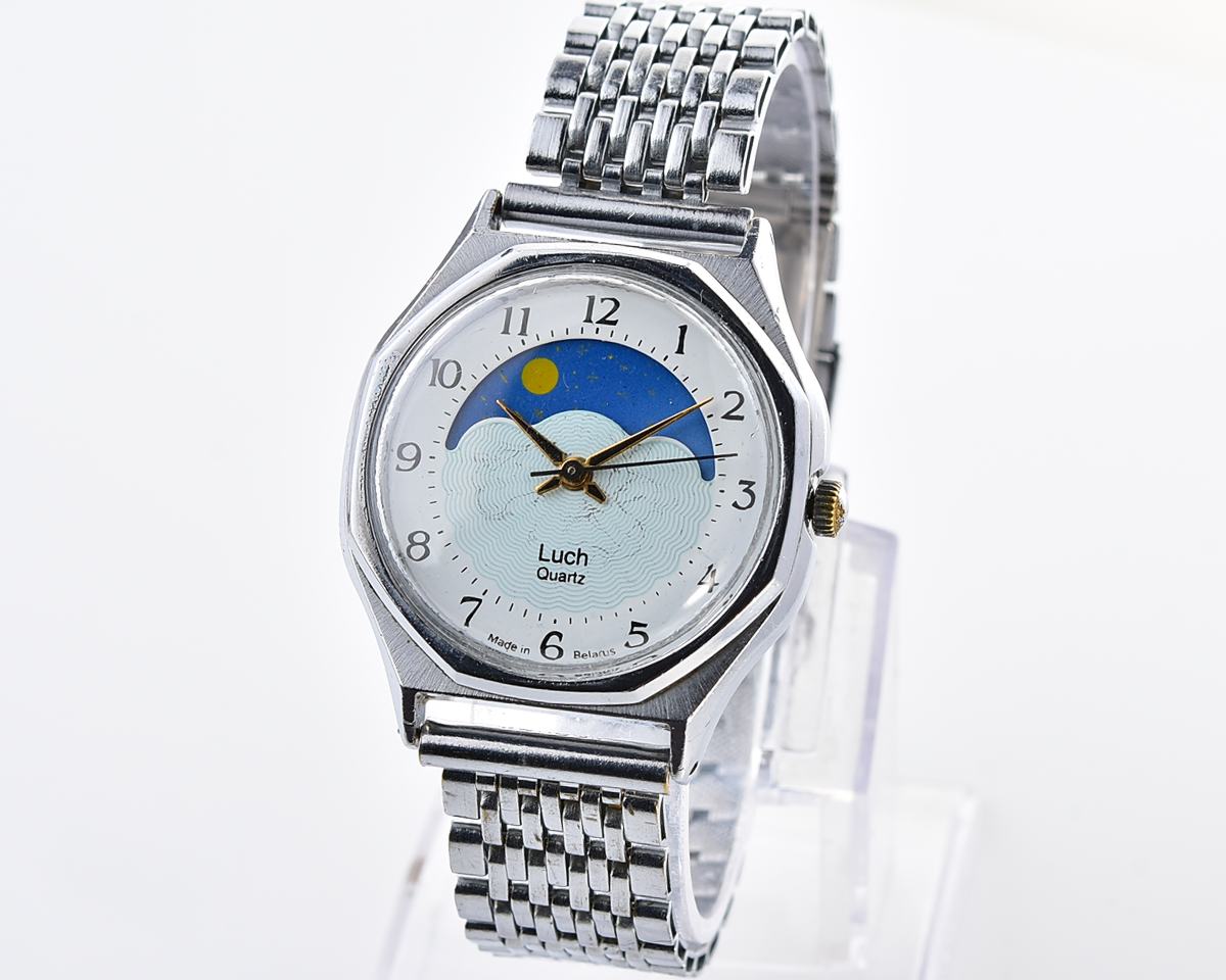 Luch quartz watch with moving Sun/Moon across the dial