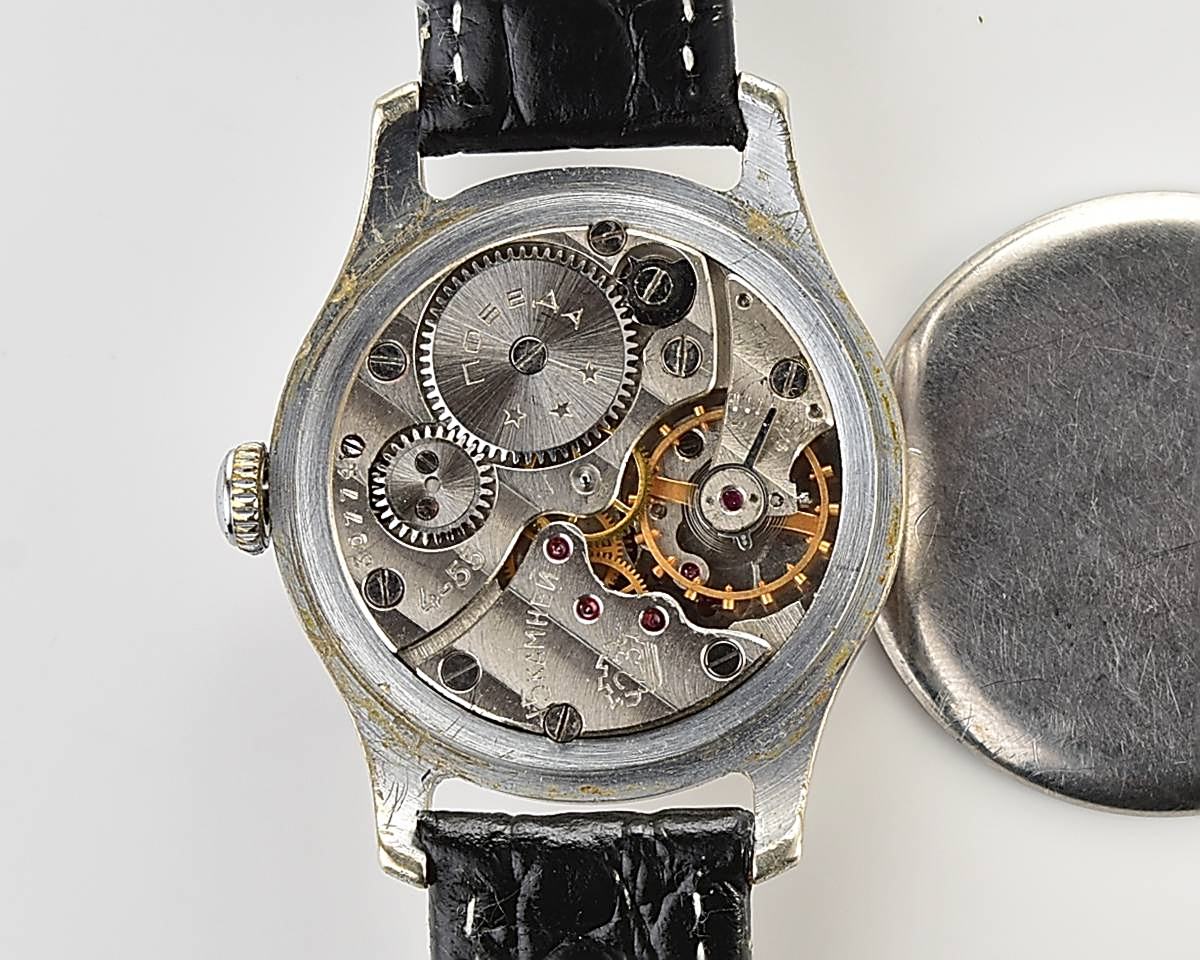 Vintage soviet POBEDA watch with bronze dial, the 4th quarter of 1955