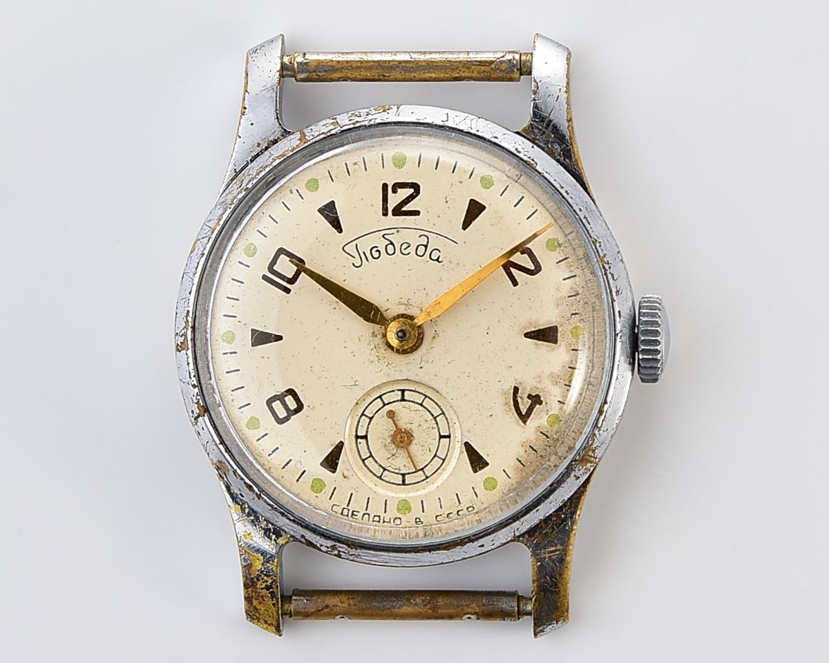 Vintage soviet mechanical watch POBEDA ZIM from the 1950s