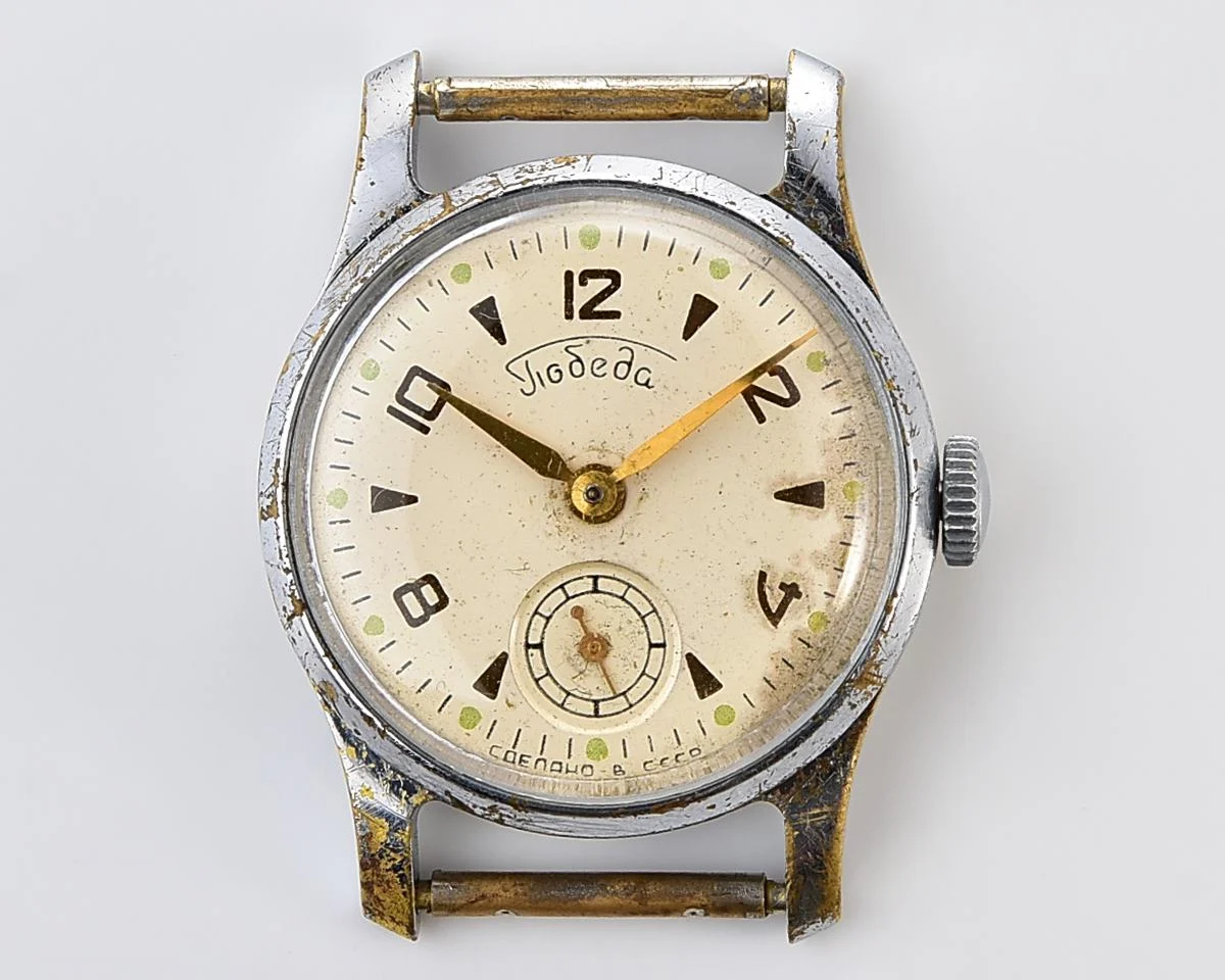 Vintage Soviet mechanical watch Pobeda Zim from the 1950s