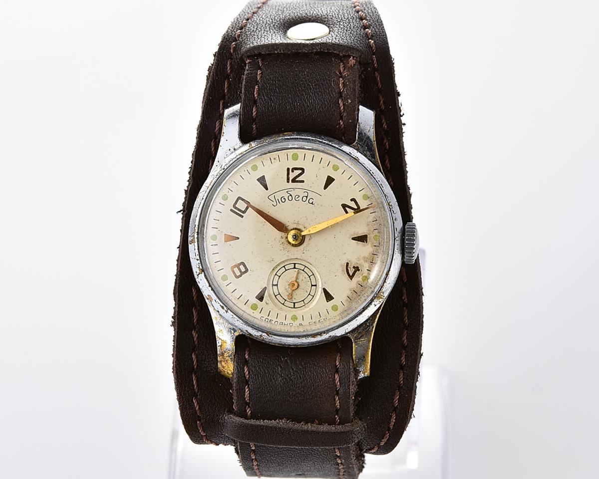 Vintage soviet mechanical watch POBEDA ZIM from the 1950s