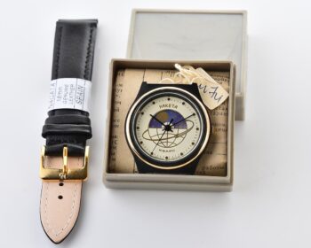 TIME CAPSULE: soviet Raketa DAY / NIGHT phases quartz watch - New Old Stock(NOS)!