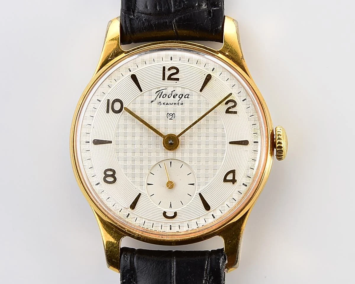 Vintage Soviet mechanical Pobeda watch with rare textured dial, 2MChZ from 1950s