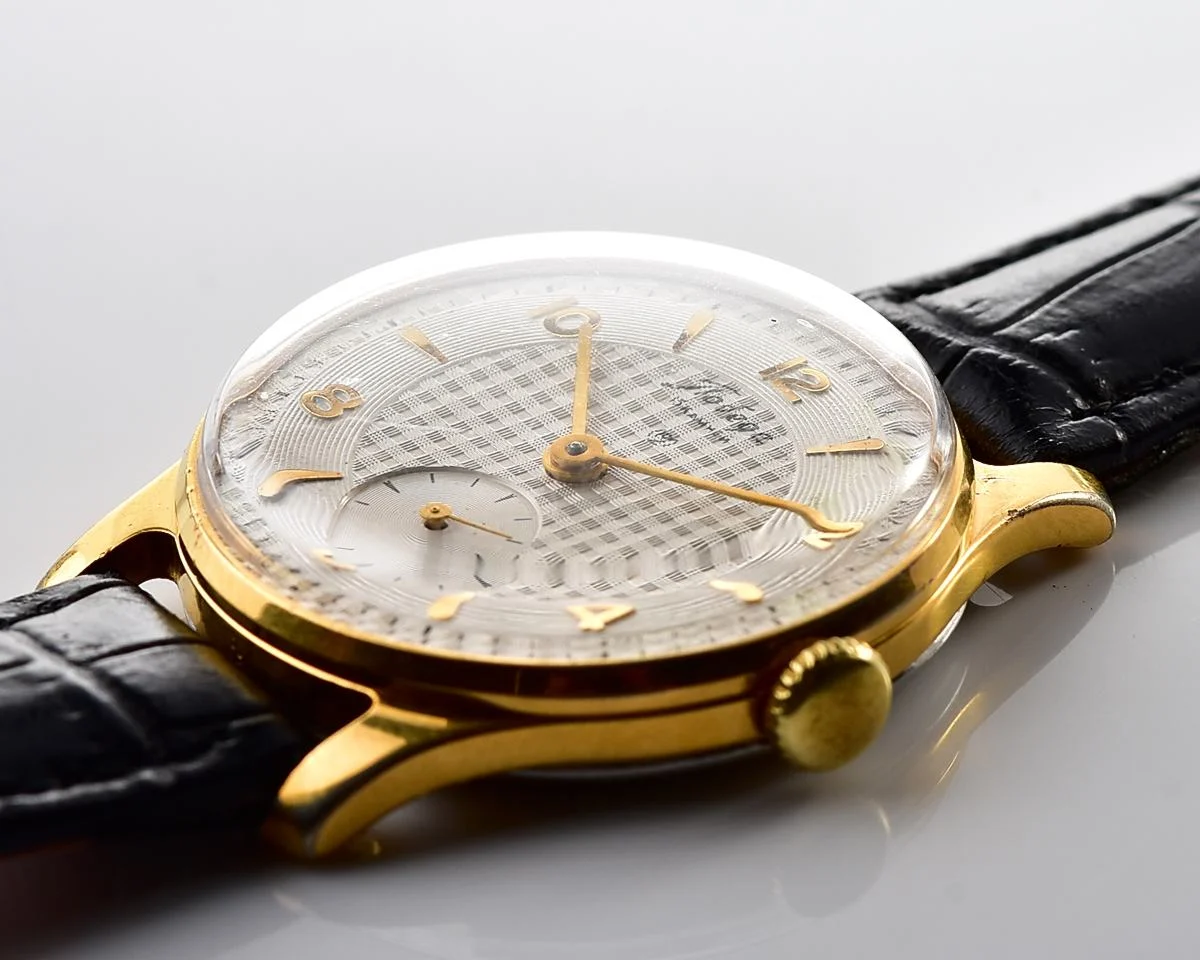 Vintage Soviet mechanical Pobeda watch with rare textured dial, 2MChZ from 1950s