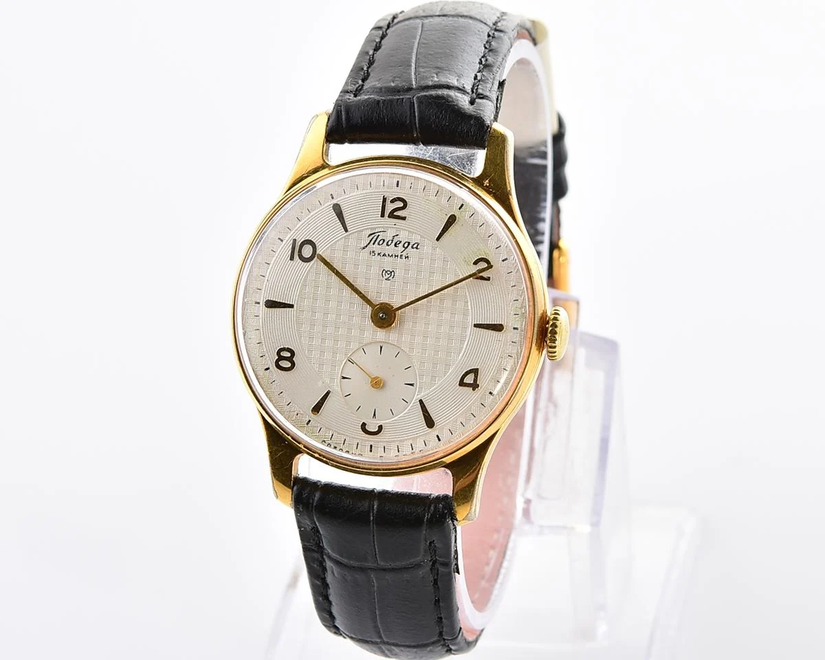 Vintage Soviet mechanical Pobeda watch with rare textured dial, 2MChZ from 1950s