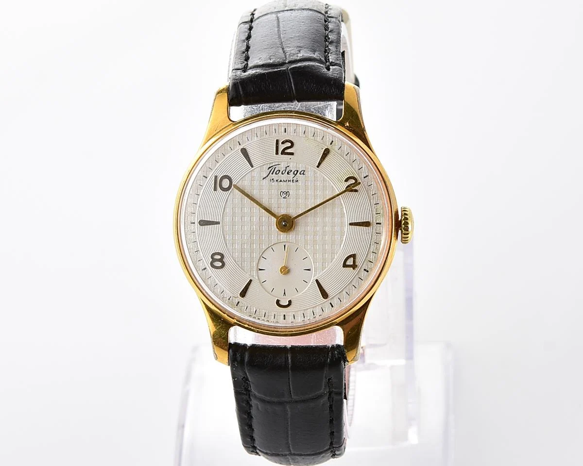 Vintage Soviet mechanical Pobeda watch with rare textured dial, 2MChZ from 1950s
