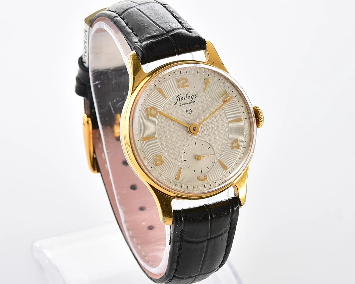 Vintage Soviet mechanical Pobeda watch with rare textured dial, 2MChZ from 1950s